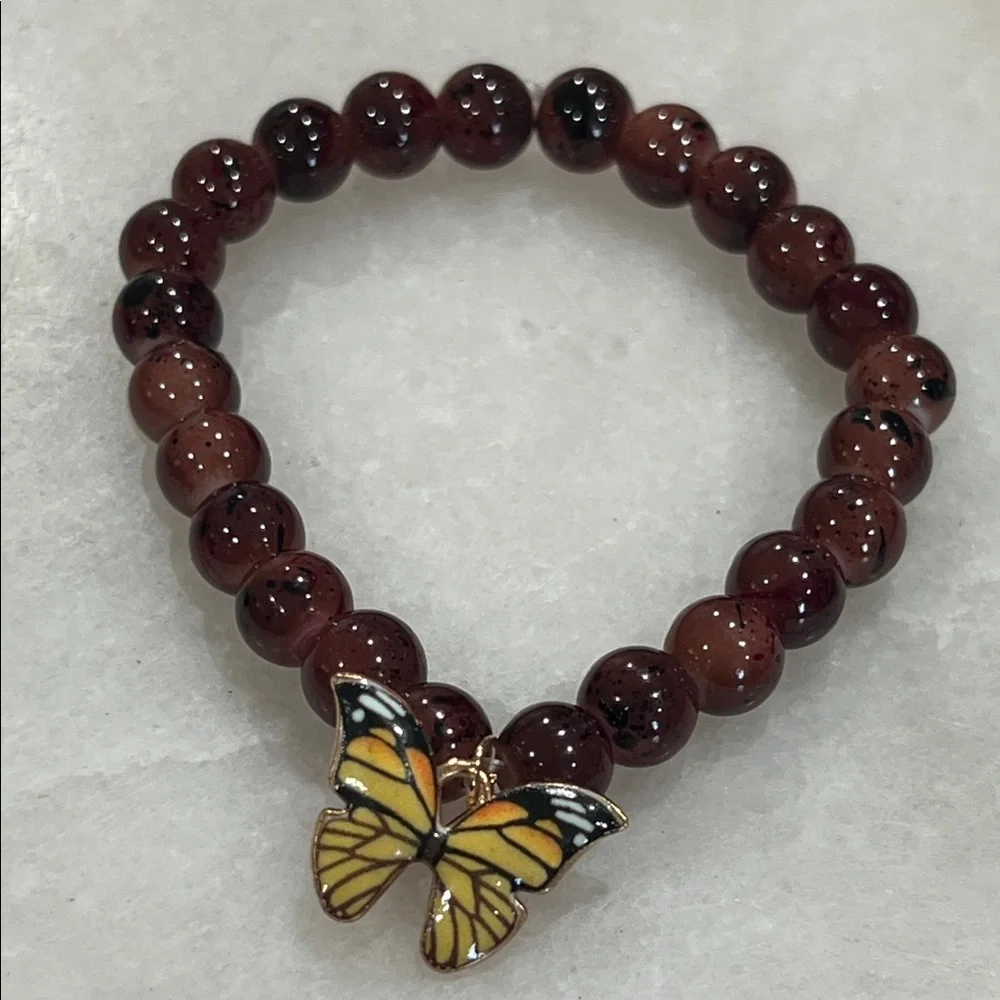 Elegant Brown Beaded Bracelet with Butterfly Charm